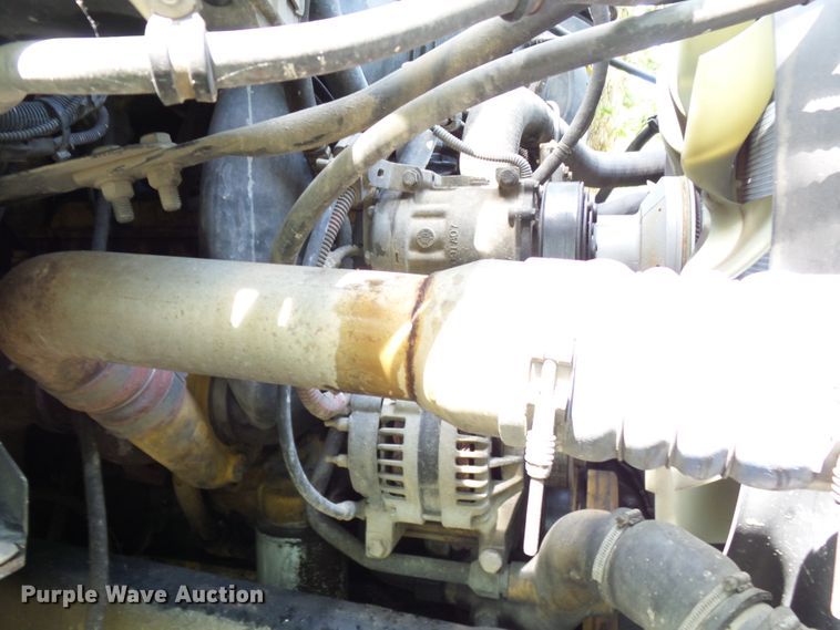 image for item DH3797 2004 Sterling L-Line  flatbed truck with forklift