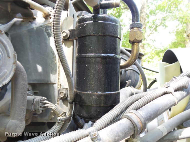 image for item DH3797 2004 Sterling L-Line  flatbed truck with forklift