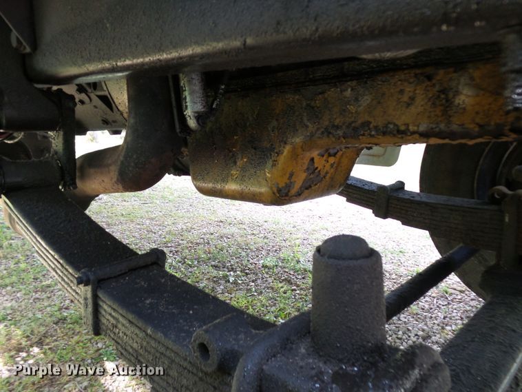 image for item DH3797 2004 Sterling L-Line  flatbed truck with forklift