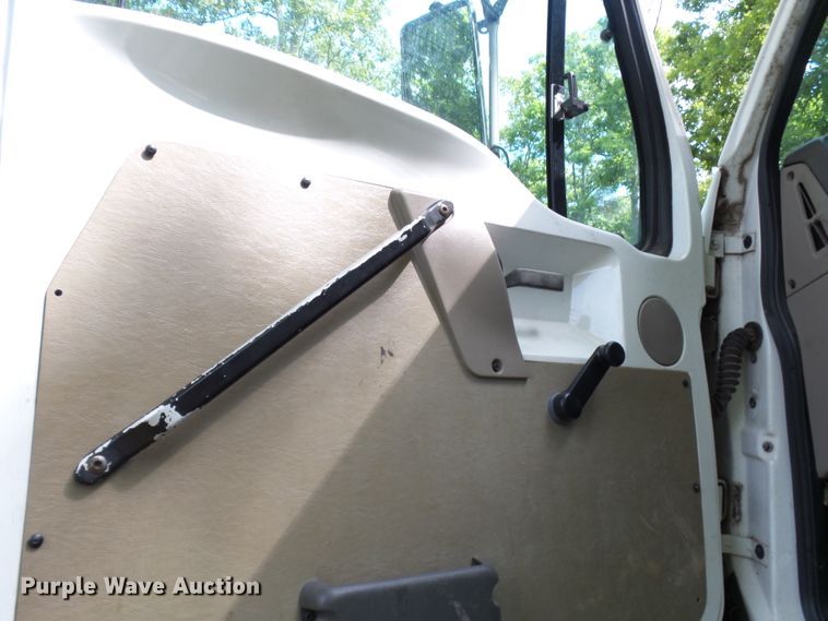 image for item DH3797 2004 Sterling L-Line  flatbed truck with forklift