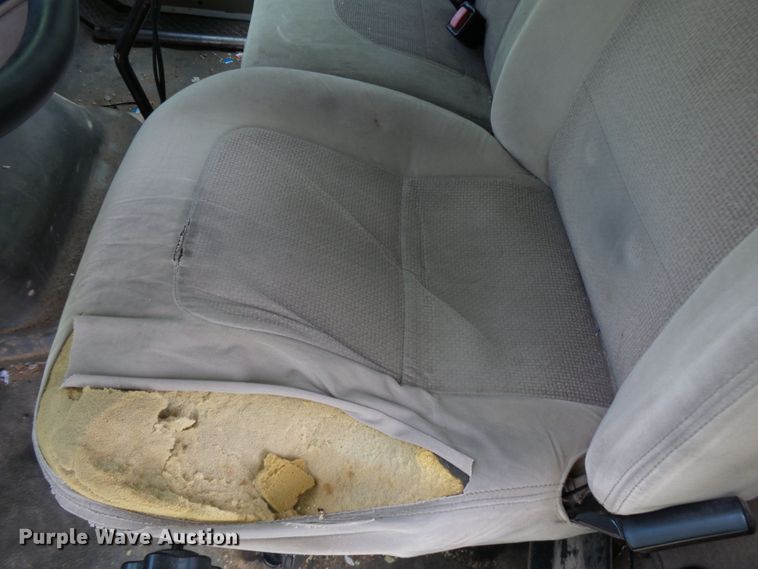 image for item DH3797 2004 Sterling L-Line  flatbed truck with forklift