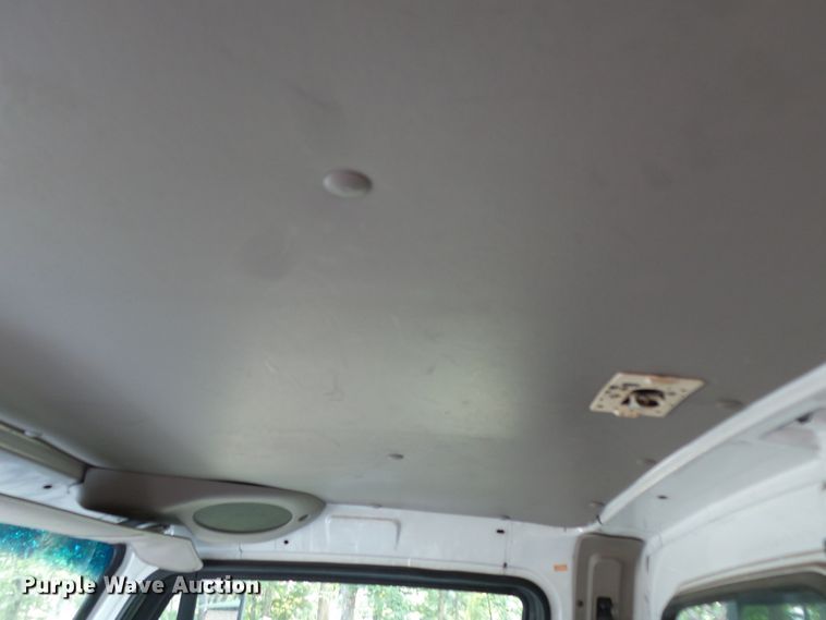 image for item DH3797 2004 Sterling L-Line  flatbed truck with forklift