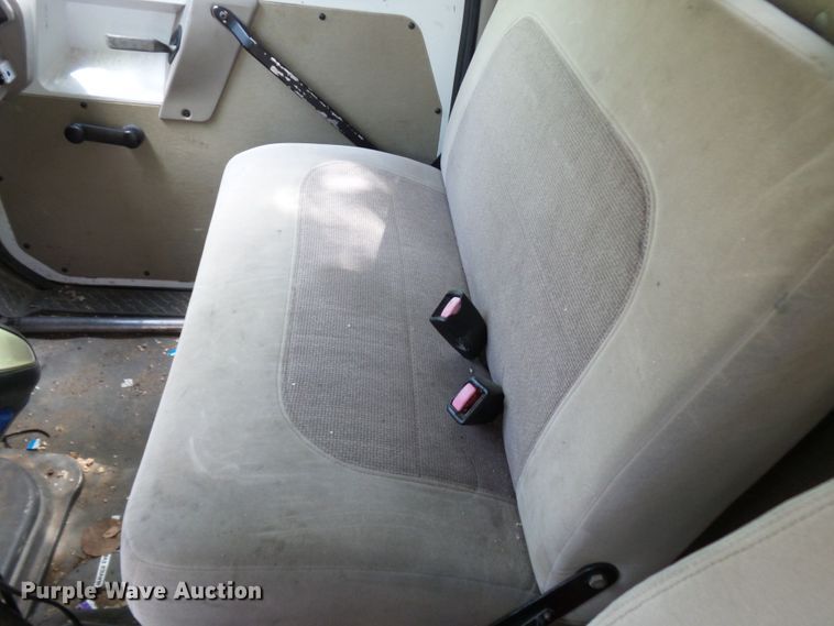 image for item DH3797 2004 Sterling L-Line  flatbed truck with forklift