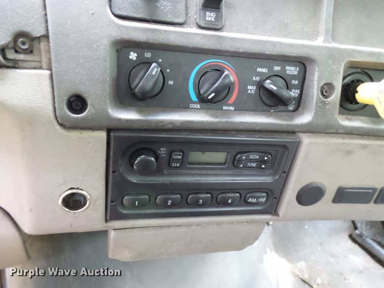 image for item DH3797 2004 Sterling L-Line  flatbed truck with forklift