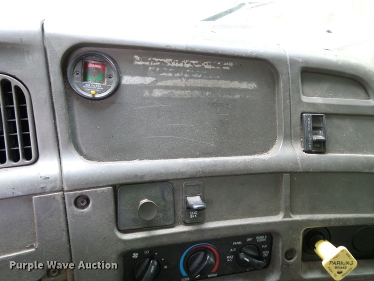 image for item DH3797 2004 Sterling L-Line  flatbed truck with forklift