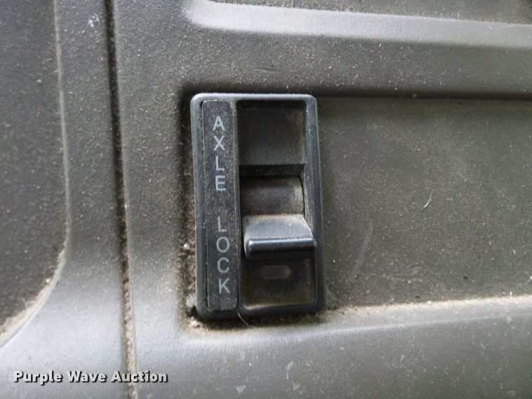 image for item DH3797 2004 Sterling L-Line  flatbed truck with forklift