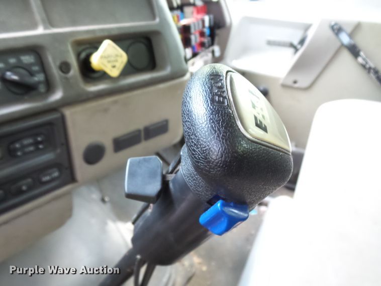 image for item DH3797 2004 Sterling L-Line  flatbed truck with forklift