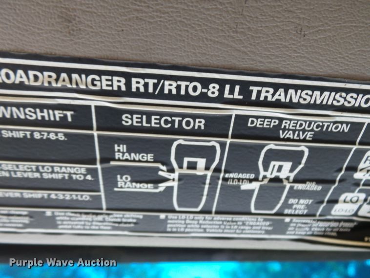image for item DH3797 2004 Sterling L-Line  flatbed truck with forklift