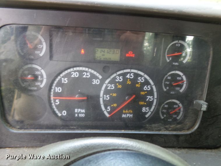 image for item DH3797 2004 Sterling L-Line  flatbed truck with forklift