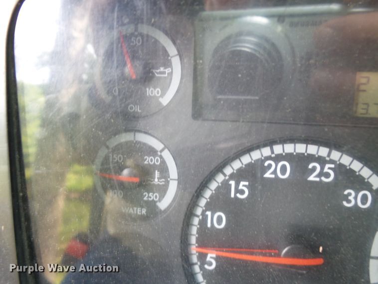 image for item DH3797 2004 Sterling L-Line  flatbed truck with forklift