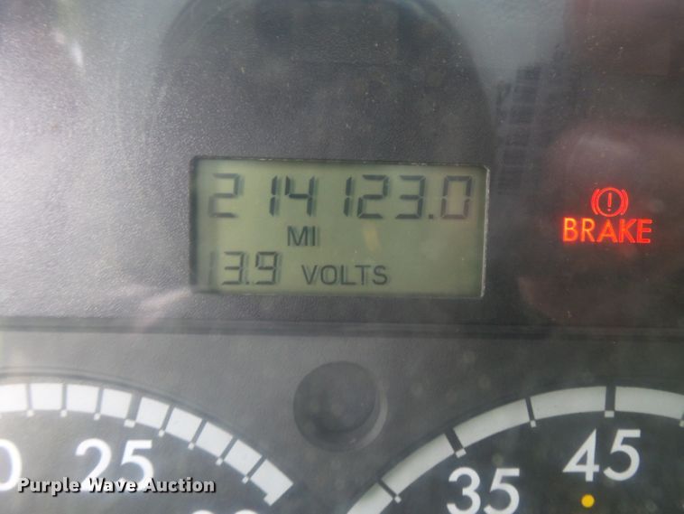 image for item DH3797 2004 Sterling L-Line  flatbed truck with forklift