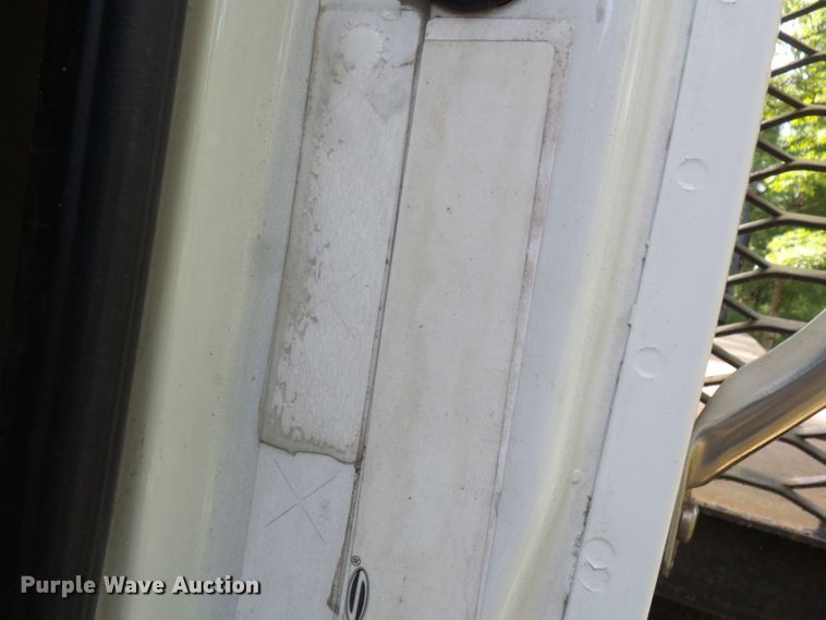 image for item DH3797 2004 Sterling L-Line  flatbed truck with forklift