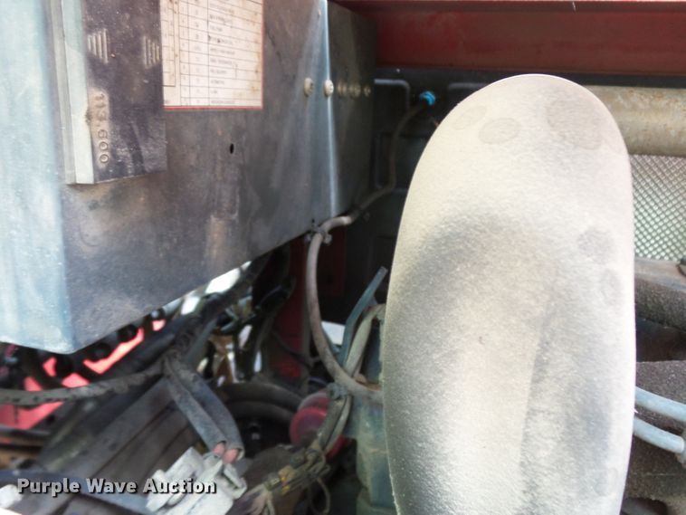 image for item DH3797 2004 Sterling L-Line  flatbed truck with forklift