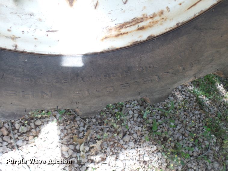 image for item DH3797 2004 Sterling L-Line  flatbed truck with forklift