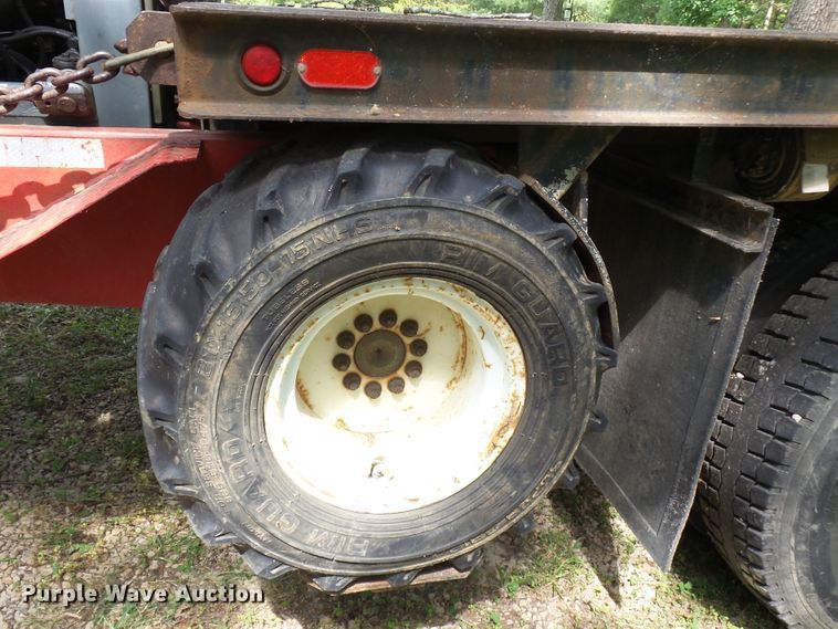 image for item DH3797 2004 Sterling L-Line  flatbed truck with forklift