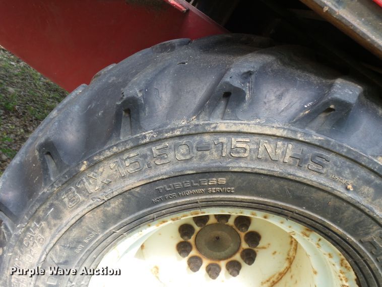 image for item DH3797 2004 Sterling L-Line  flatbed truck with forklift