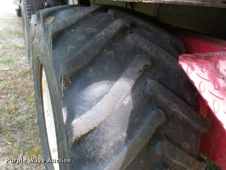 image for item DH3797 2004 Sterling L-Line  flatbed truck with forklift