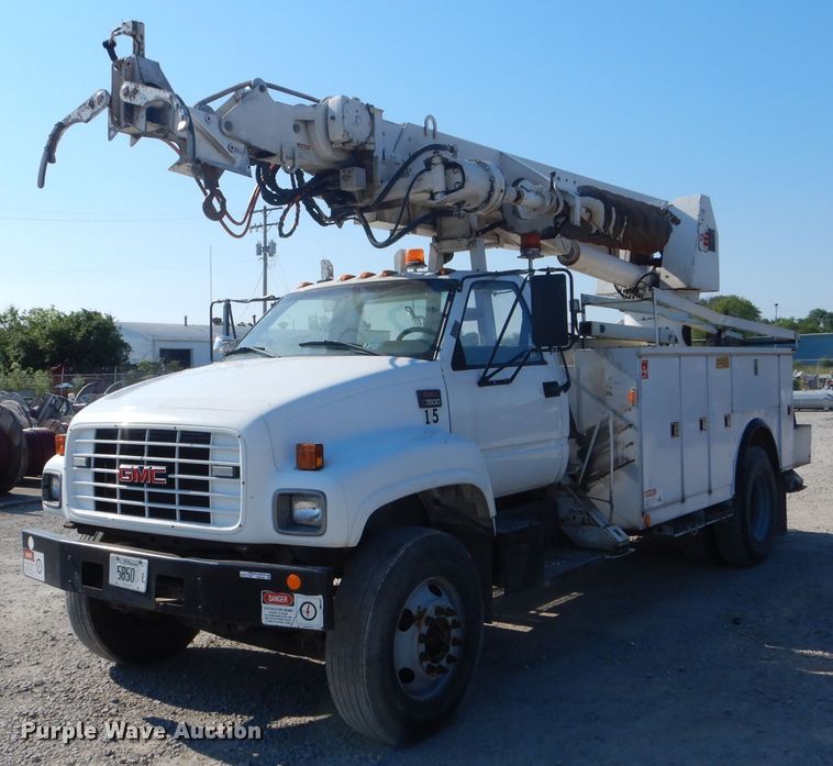 image for item HM9558 2000 GMC C7500  digger derrick truck