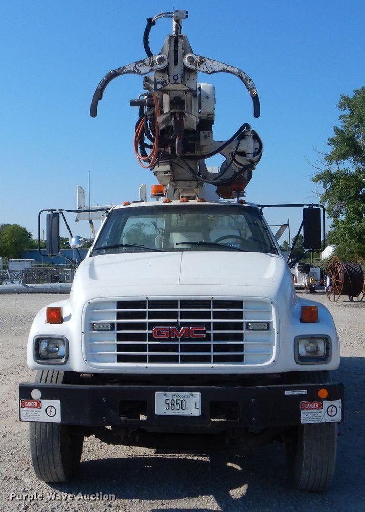 image for item HM9558 2000 GMC C7500  digger derrick truck