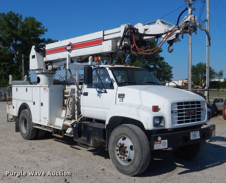 image for item HM9558 2000 GMC C7500  digger derrick truck