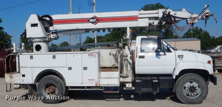 image for item HM9558 2000 GMC C7500  digger derrick truck