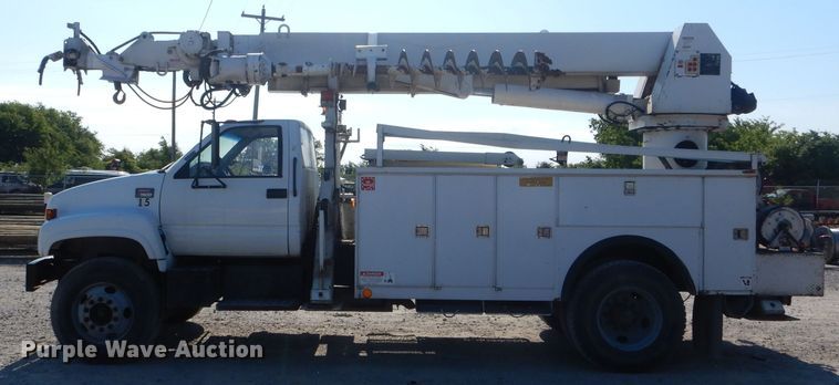 image for item HM9558 2000 GMC C7500  digger derrick truck