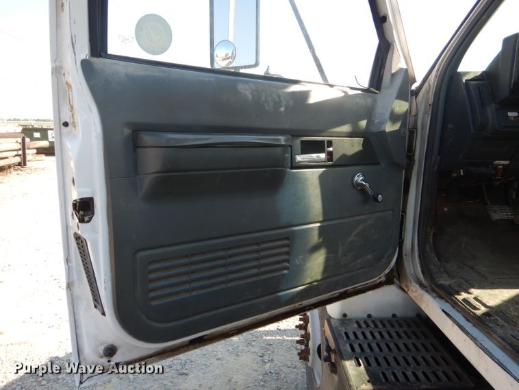 image for item HM9558 2000 GMC C7500  digger derrick truck