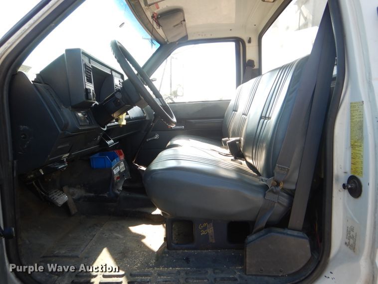 image for item HM9558 2000 GMC C7500  digger derrick truck