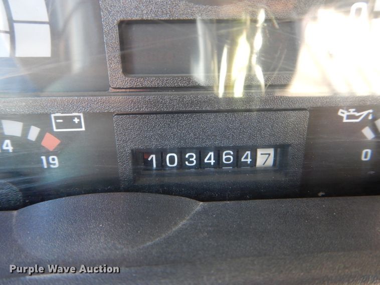 image for item HM9558 2000 GMC C7500  digger derrick truck