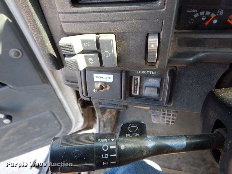 image for item HM9558 2000 GMC C7500  digger derrick truck