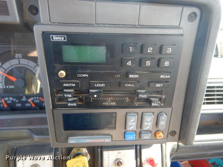 image for item HM9558 2000 GMC C7500  digger derrick truck