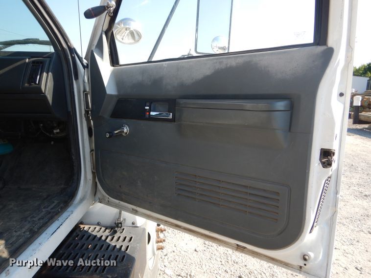 image for item HM9558 2000 GMC C7500  digger derrick truck