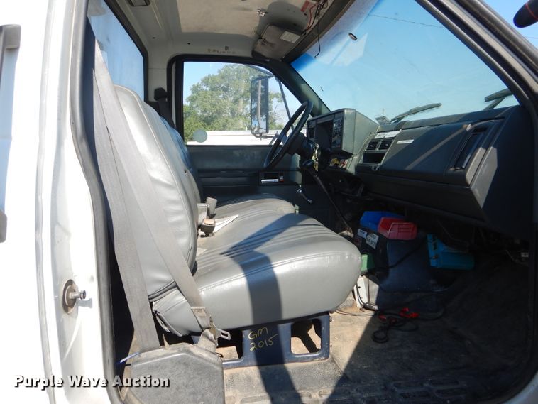 image for item HM9558 2000 GMC C7500  digger derrick truck