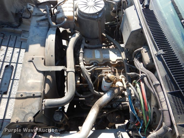 image for item HM9558 2000 GMC C7500  digger derrick truck