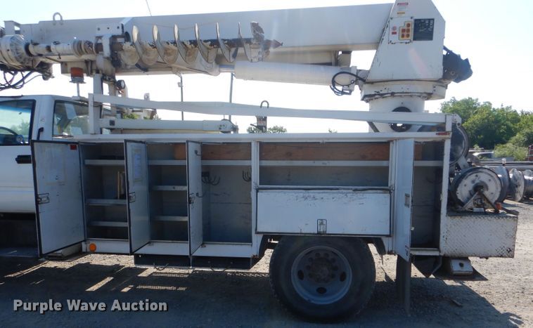 image for item HM9558 2000 GMC C7500  digger derrick truck