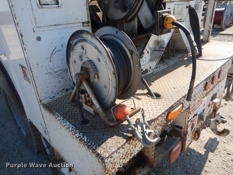 image for item HM9558 2000 GMC C7500  digger derrick truck