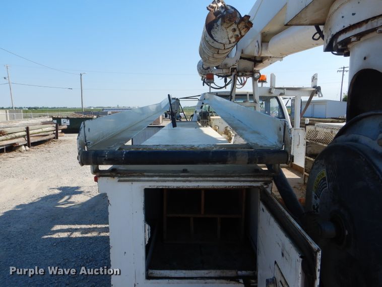 image for item HM9558 2000 GMC C7500  digger derrick truck