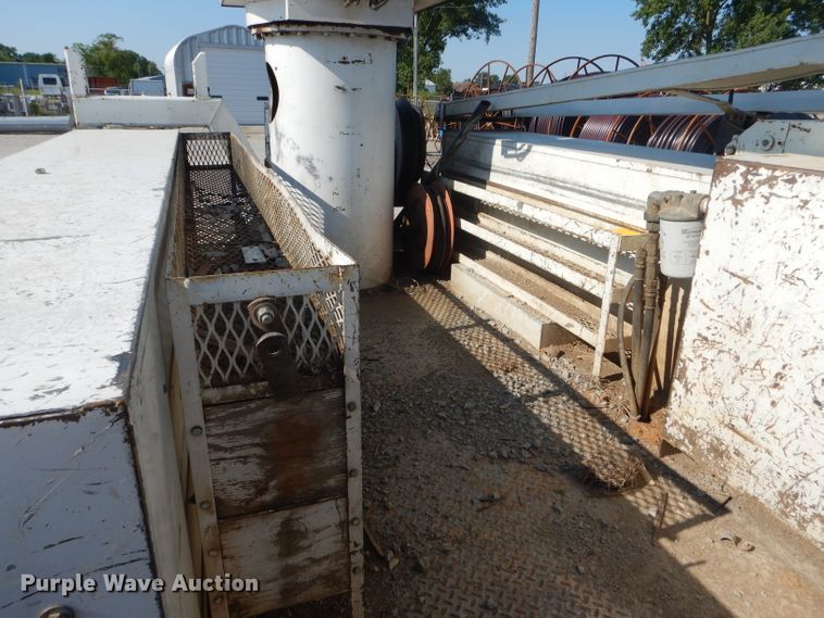 image for item HM9558 2000 GMC C7500  digger derrick truck