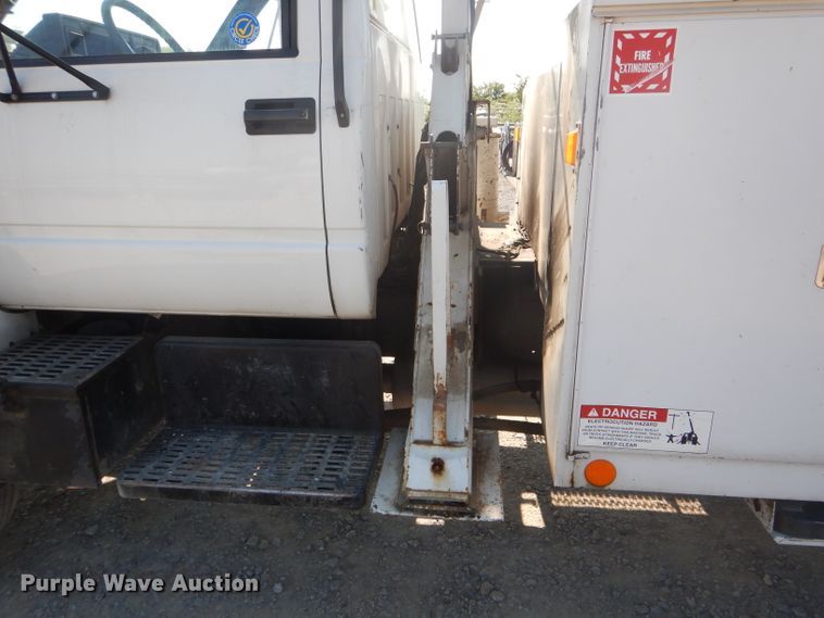 image for item HM9558 2000 GMC C7500  digger derrick truck