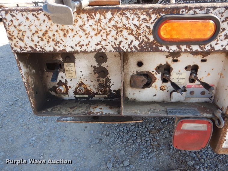 image for item HM9558 2000 GMC C7500  digger derrick truck