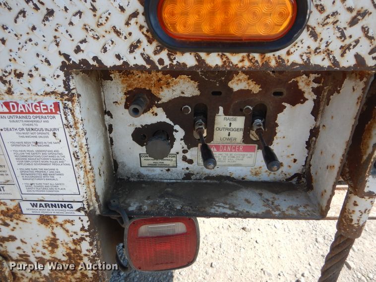 image for item HM9558 2000 GMC C7500  digger derrick truck