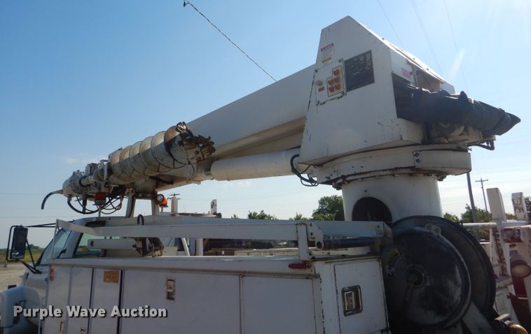 image for item HM9558 2000 GMC C7500  digger derrick truck