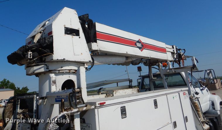 image for item HM9558 2000 GMC C7500  digger derrick truck