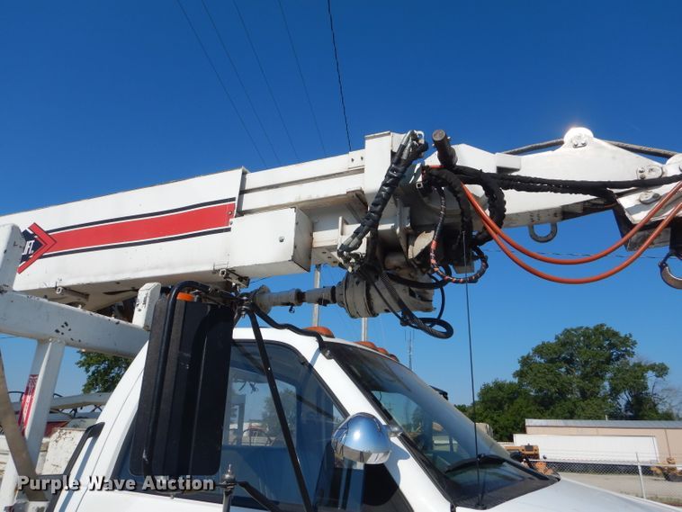 image for item HM9558 2000 GMC C7500  digger derrick truck