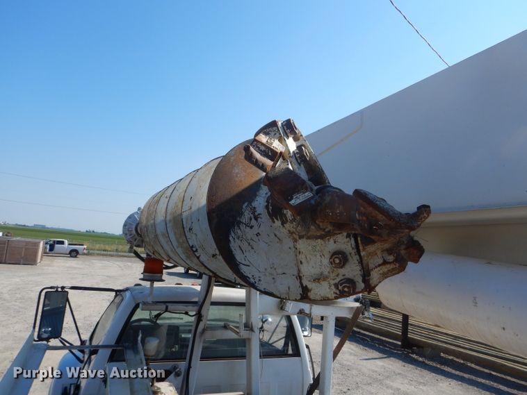 image for item HM9558 2000 GMC C7500  digger derrick truck