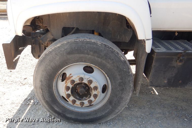 image for item HM9558 2000 GMC C7500  digger derrick truck