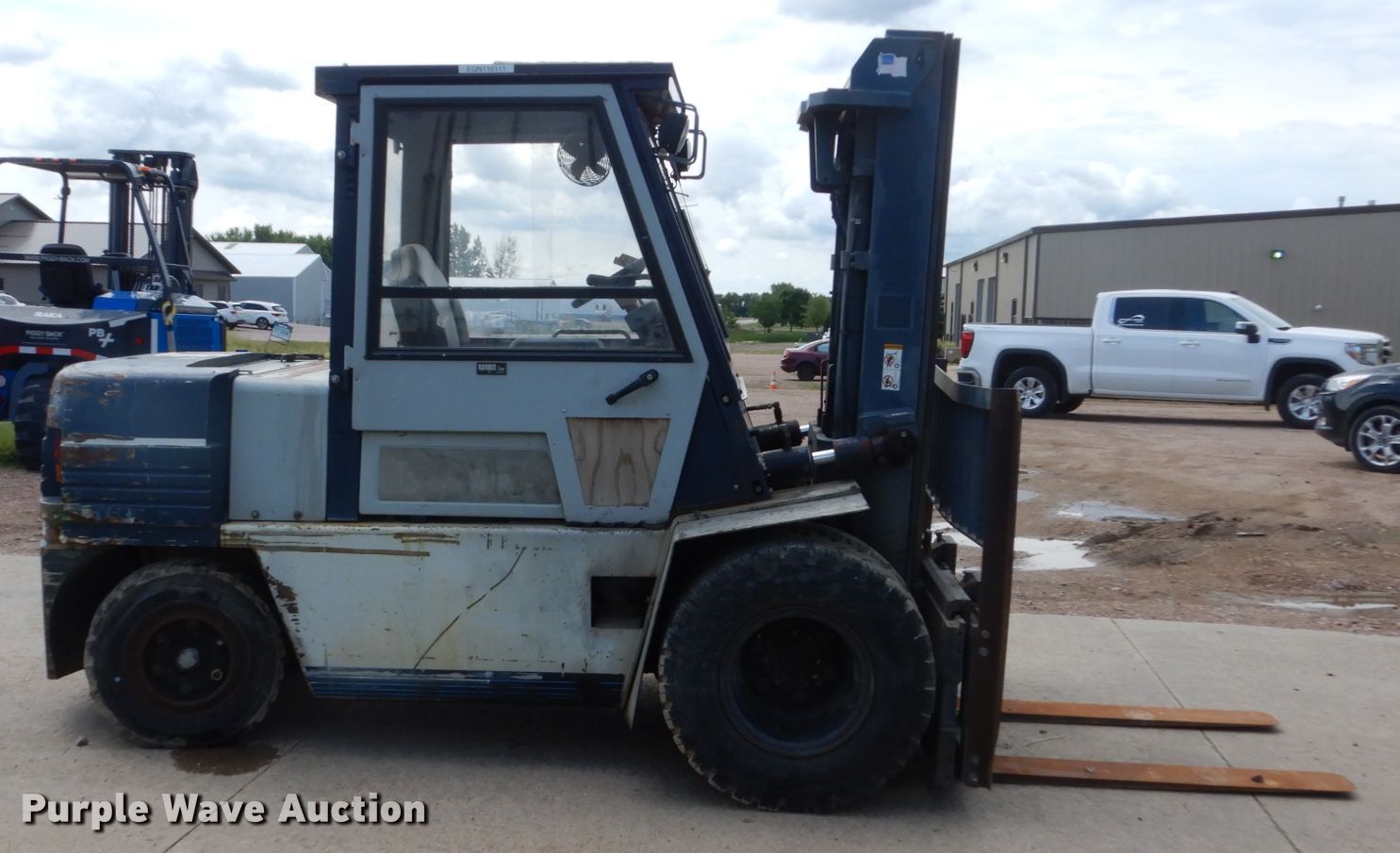 Komatsu FG45T6 forklift in Sioux Falls, SD Item GA9101 sold Purple