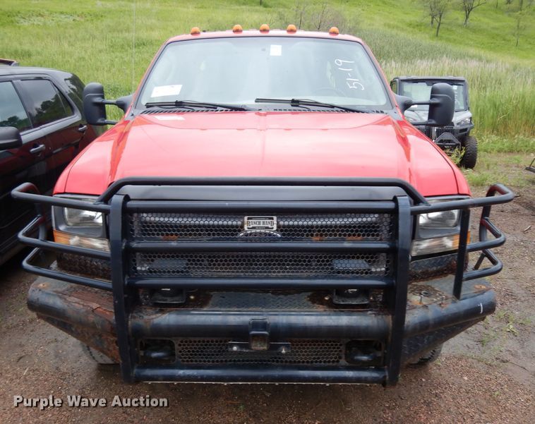 image for item DH5529 2004 Ford F550 Super Duty  Crew Cab utility bed truck