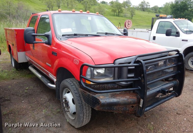 image for item DH5529 2004 Ford F550 Super Duty  Crew Cab utility bed truck