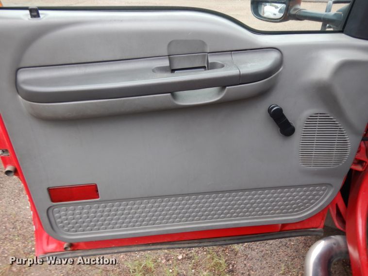 image for item DH5529 2004 Ford F550 Super Duty  Crew Cab utility bed truck